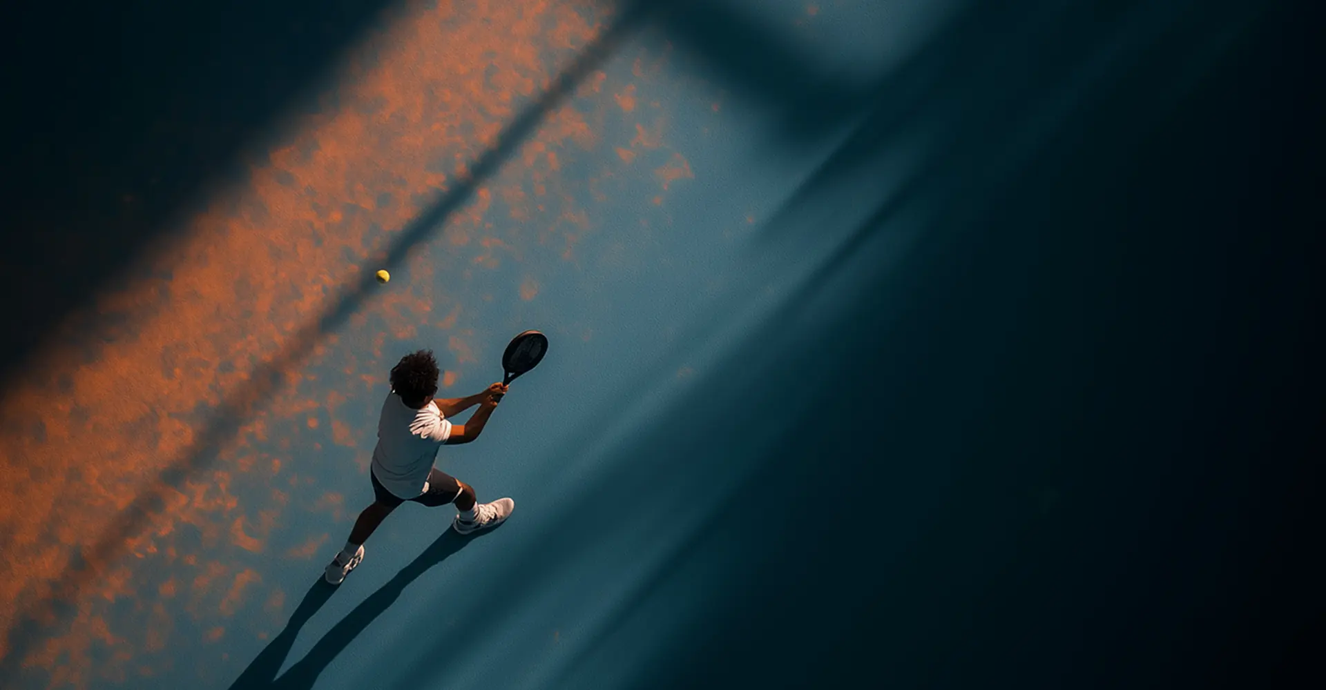 Overhead view of a player striking the ball